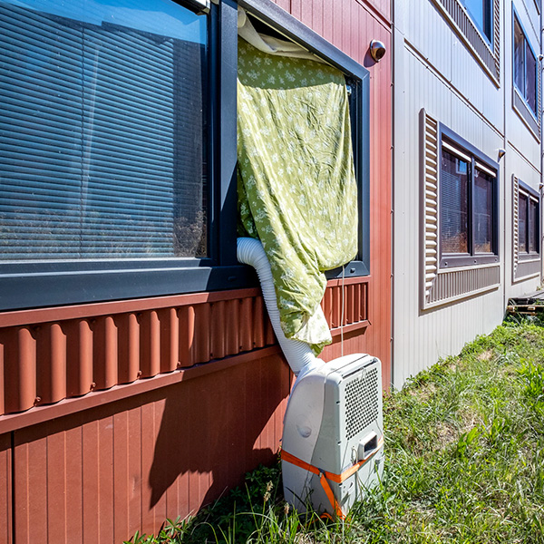Redt de airco levens, of nekt hij juist ons stroomnet?